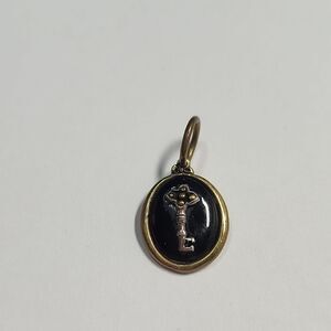 Rare Waxing Poetic Key Oval Pendant Realize True Riches Charm